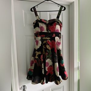Black floral playful vintage style summer dress by Eva Rose